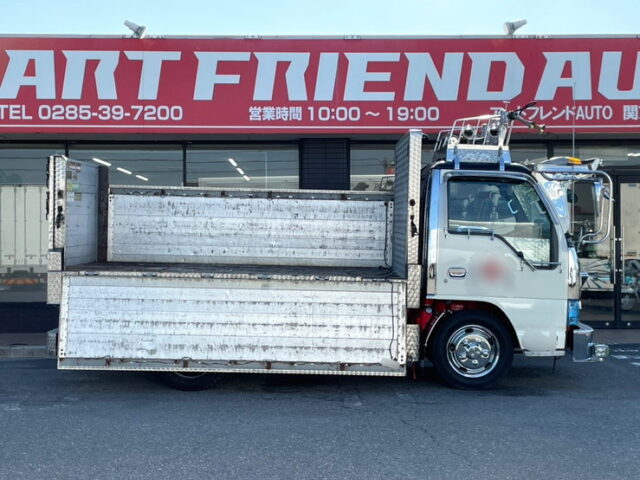 いすゞ：エルフ：造り平ボディ：内装生地張り：5MT：オバＱバンパー：フロントバイザー：架装多数