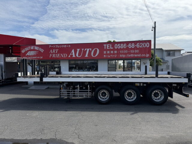 トレクス：平床セミトレーラー：アオリ20㎝：5方開：3軸：板バネ：最大積載量28.500㎏