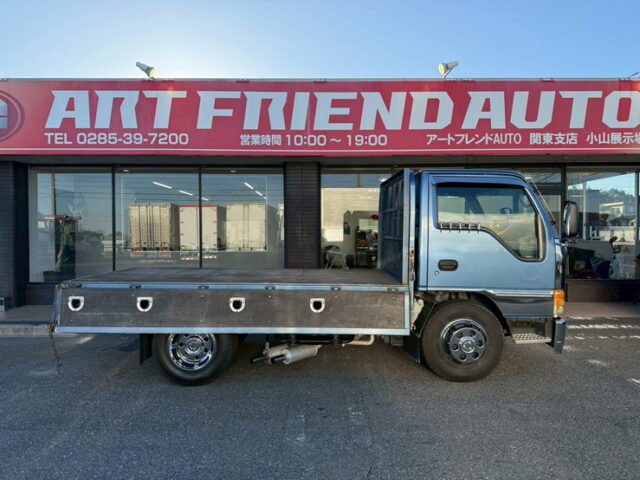 いすゞ:エルフ:平ボデー:標準幅:10尺長:マニ割り:ハイグレード:140馬力