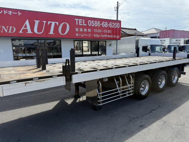 トレクス：平床セミトレーラー：アオリ20㎝：5方開：3軸：板バネ：最大積載量28.500㎏