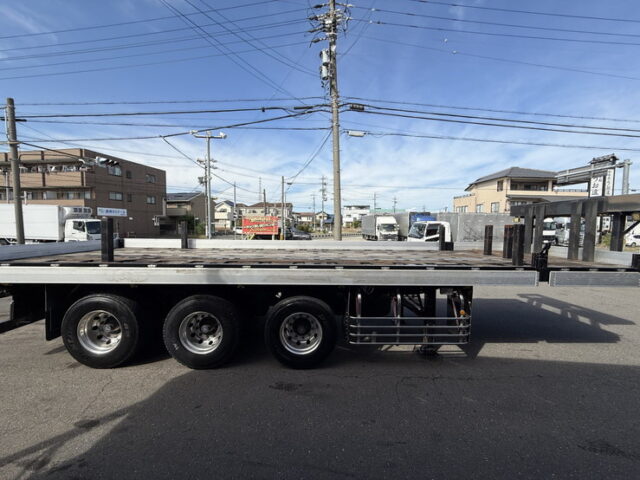 トレクス：平床セミトレーラー：アオリ20㎝：5方開：3軸：板バネ：最大積載量28.500㎏