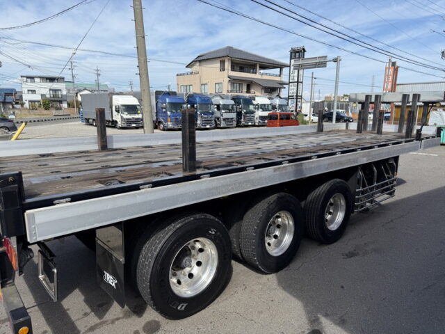 トレクス：平床セミトレーラー：アオリ20㎝：5方開：3軸：板バネ：最大積載量28.500㎏