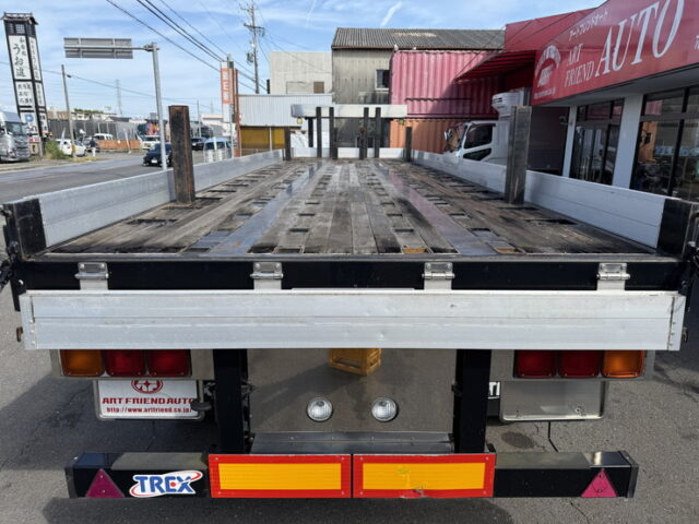 トレクス：平床セミトレーラー：アオリ20㎝：5方開：3軸：板バネ：最大積載量28.500㎏