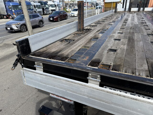 トレクス：平床セミトレーラー：アオリ20㎝：5方開：3軸：板バネ：最大積載量28.500㎏