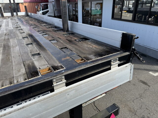 トレクス：平床セミトレーラー：アオリ20㎝：5方開：3軸：板バネ：最大積載量28.500㎏