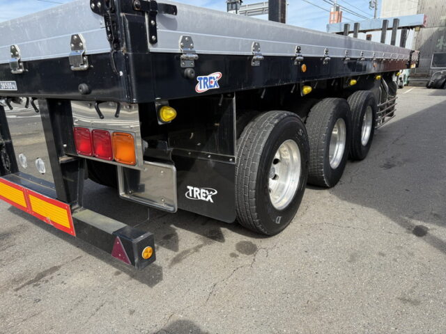 トレクス：平床セミトレーラー：アオリ20㎝：5方開：3軸：板バネ：最大積載量28.500㎏