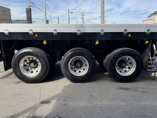 トレクス：平床セミトレーラー：アオリ20㎝：5方開：3軸：板バネ：最大積載量28.500㎏