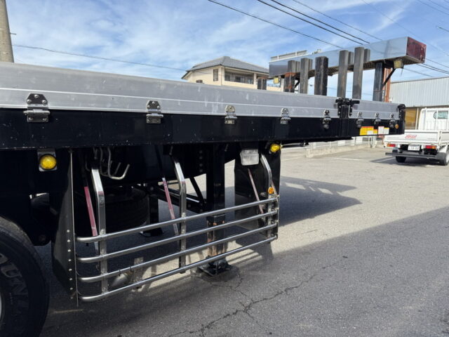トレクス：平床セミトレーラー：アオリ20㎝：5方開：3軸：板バネ：最大積載量28.500㎏