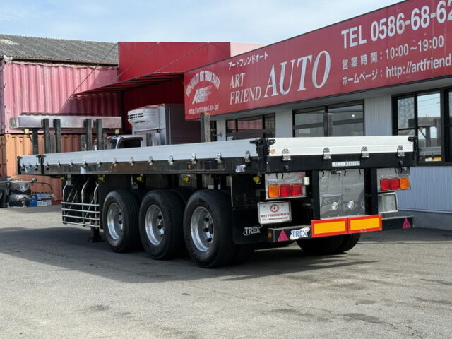 トレクス：平床セミトレーラー：アオリ20㎝：5方開：3軸：板バネ：最大積載量28.500㎏