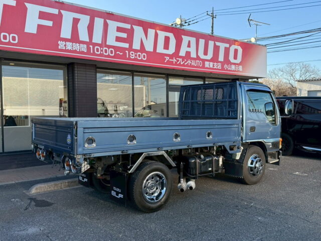 いすゞ:エルフ:平ボデー:標準幅:10尺長:マニ割り:ハイグレード:140馬力