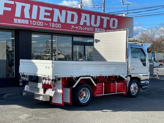 いすゞ　エルフ　平ボディ　5MT　フロントバイザー　プロテク縞板　木床　内装生地張り