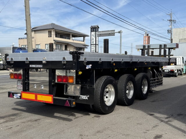 トレクス：平床セミトレーラー：アオリ20㎝：5方開：3軸：板バネ：最大積載量28.500㎏