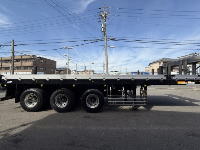 トレクス：平床セミトレーラー：アオリ20㎝：5方開：3軸：板バネ：最大積載量28.500㎏