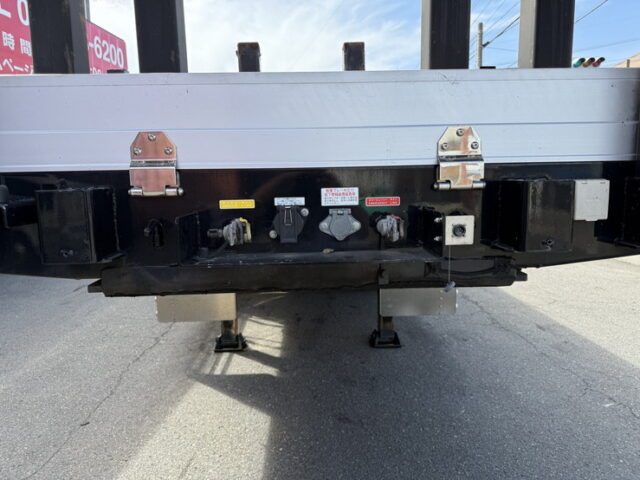 トレクス：平床セミトレーラー：アオリ20㎝：5方開：3軸：板バネ：最大積載量28.500㎏